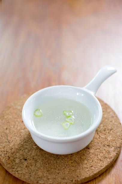 istock broth with spring onions - kuah kaldu 1319855967