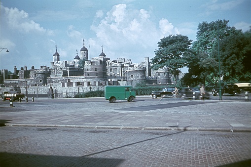 London, England, UK, 1956. London street scene. In the background the Tower of London.