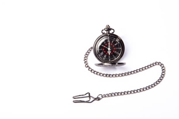 istock Antique watch, beautiful antique pocket watch on white surface, selective focus. 1319858655