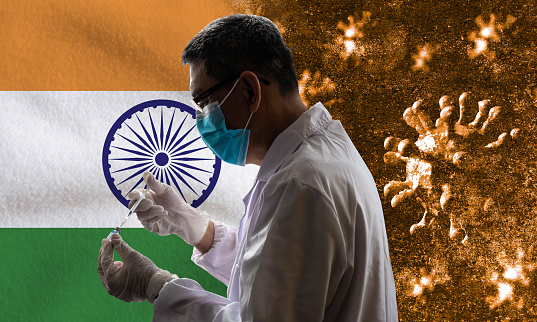 Coronavirus 2019-nCoV and Illness Prevention, Healthcare and Medicine, Vaccination, Immunization & Treatment against Flag of India Background Concepts.  Coronavirus COVID-19 can damage human lungs, leading to severe respiratory issues. Rough and textured background indicated the damaged lungs caused by Coronavirus attacked.
