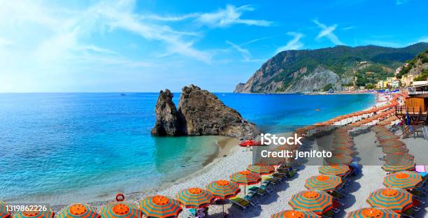 Panoramic View Over Colorful Umbrellas At A Beach In The Cinque Terre Italy Stock Photo - Download Image Now