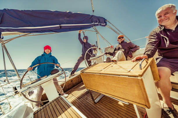 istock friends on the sailing boat 1319865309