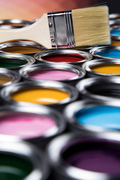 istock Colorful paint cans with paintbrush 1319869045