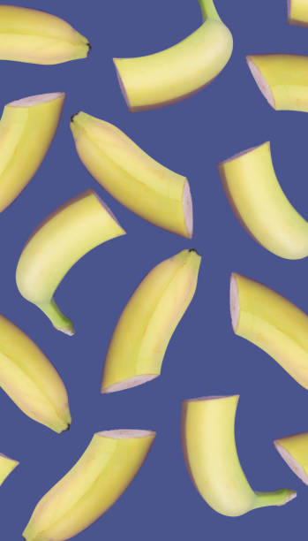 istock Banana slices on trendy pastel blue background 1319869900