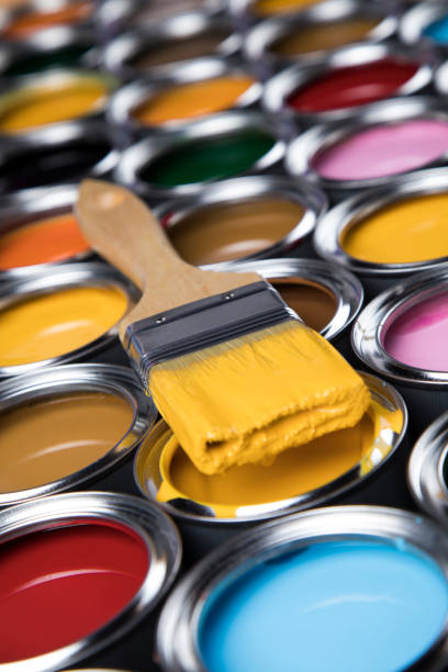 istock Colorful paint cans with paintbrush 1319870704
