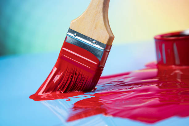 istock Open paint cans with a brush, Rainbow colors 1319870828