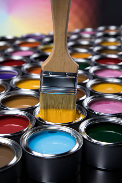 istock Colorful paint cans with paintbrush 1319870833