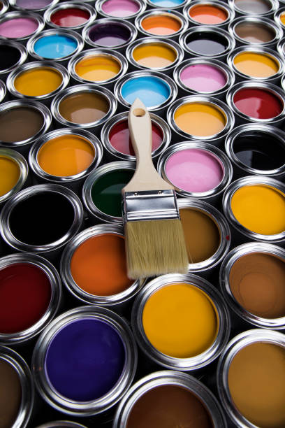 istock Colorful paint cans with paintbrush 1319870882