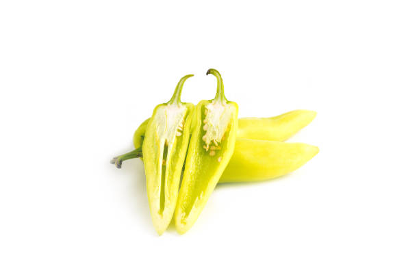 Fresh green sweet pepper slice on white background. Banana pepper.