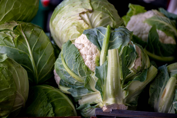 istock Cauliflowers at an open air market. 1319872652