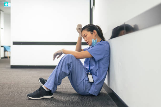 istock Emotional nurse takes a break 1319877928