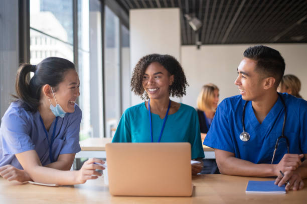 istock Nurses take a break from their shift to review a patients file 1319877960