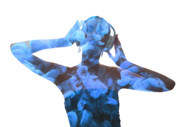istock double exposure silhouette music blue smoke woman 1319878521