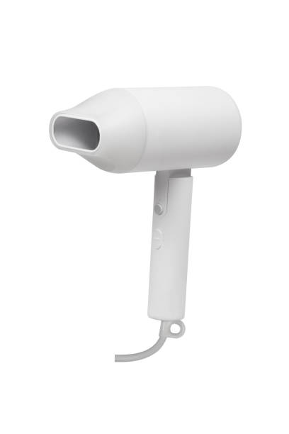 Hair dryer with nozzle in horizontal position isolated on white background.