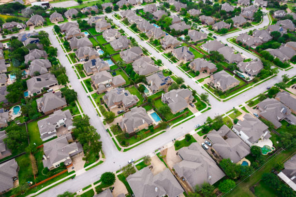 istock High above Modern suburbs green trees and modern landscape 1319878923