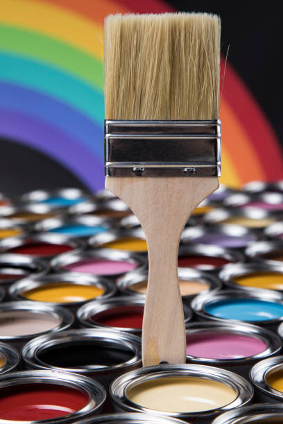 istock Colorful paint cans with paintbrush 1319881836