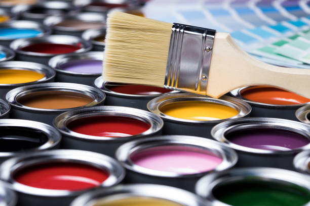 istock Colorful paint cans with paintbrush 1319882419