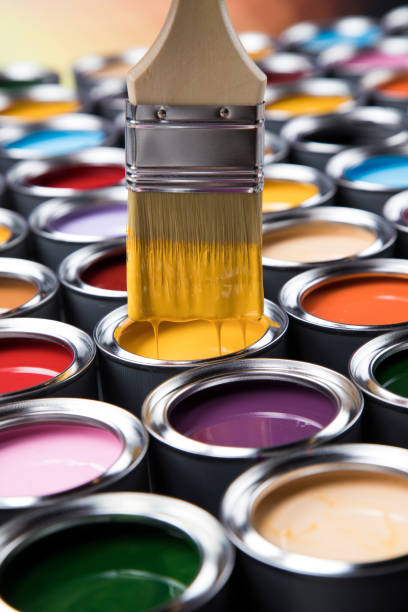 istock Colorful paint cans with paintbrush 1319882550