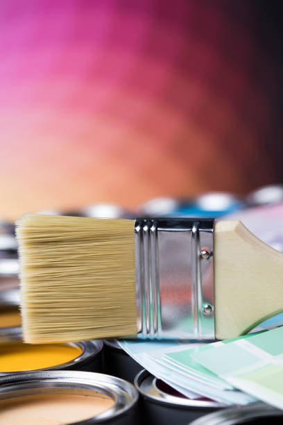 istock Colorful paint cans with paintbrush 1319884410