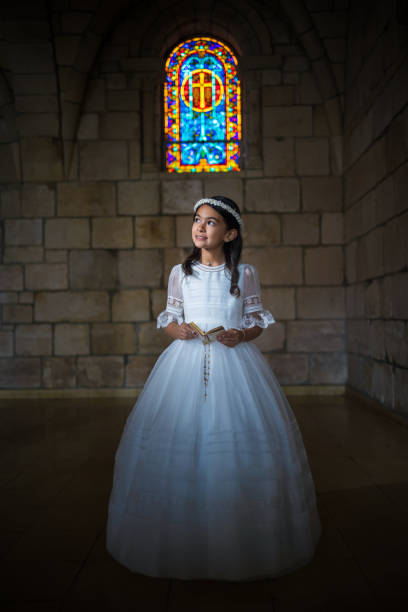 istock Happy First Communion girl 1319886353
