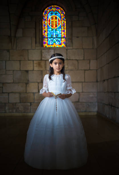 istock First Communion girl inside church 1319886414