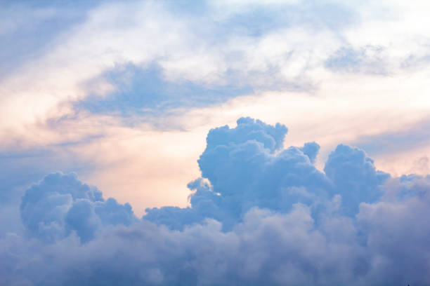 istock Beautiful sunset sky with multi-colored clouds. Rain clouds and stormy clouds 1319888599
