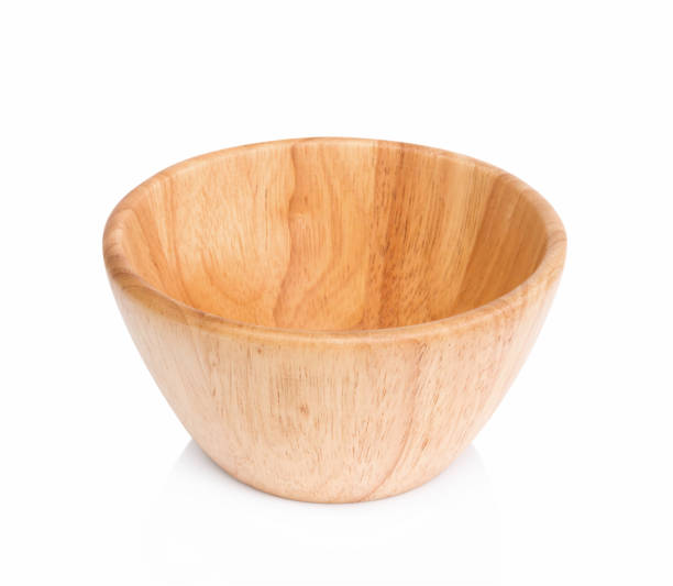 istock Closeup empty wooden bowl isolated on white background 1319896683