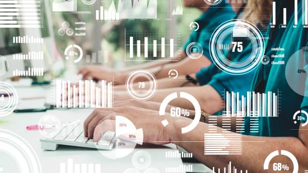 istock Creative visual of business people in working at computer desk 1319897573