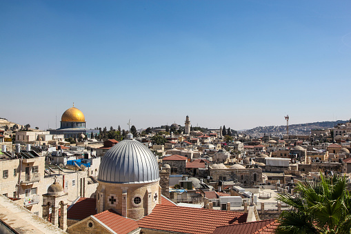 Panoramic rooftop view of old city and Al Aqsa Mosque and dome of Church of St Mary of Agony