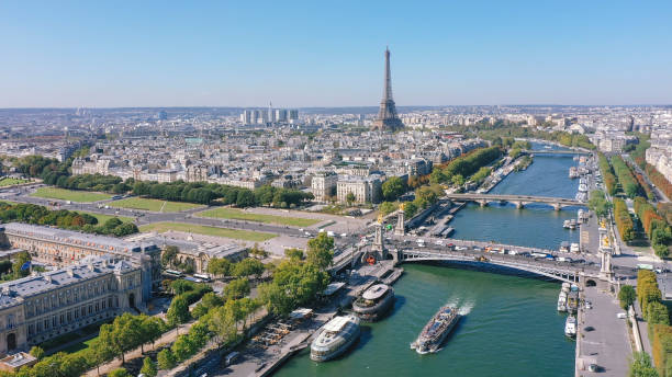 Aerial view of Paris with Seine river and Eiffel Tower Aerial view of Paris with Seine river and Eiffel Tower seine river stock pictures, royalty-free photos & images