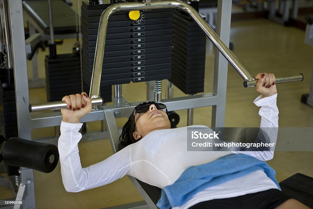 Woman exercising Woman in gym, selective focus, canon 1Ds mark III 30-39 Years Stock Photo