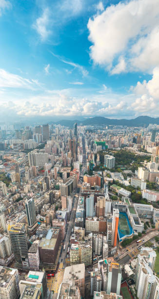 vista aérea épica de tsim sha tsui, centro comercial e comercial de hong kong, durante o dia - hong shopping night skyline - fotografias e filmes do acervo