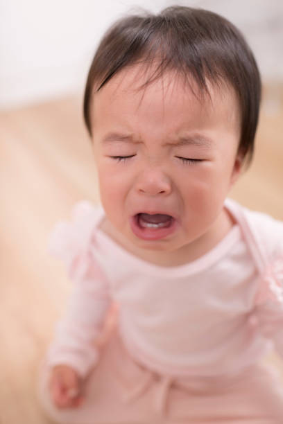 istock Little girl weeping and crying 1319911636