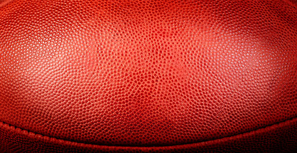 istock Football Texture with center spotlight 131991254