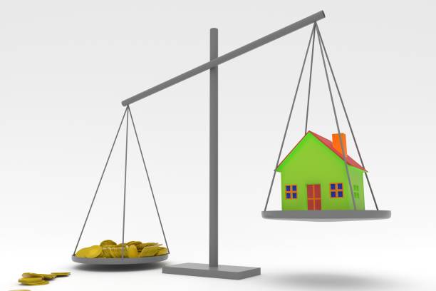 istock 3D illustration. Scales symbol with coins and home 1319914633
