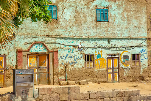 Poor buildings on the Nile canal near Qena, Egypt