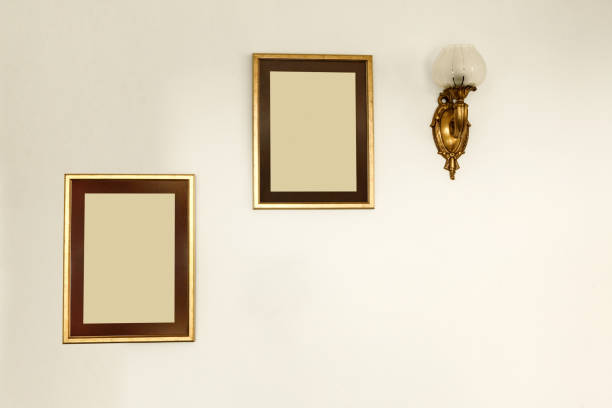 Empty frames on the living room wall with clipping path