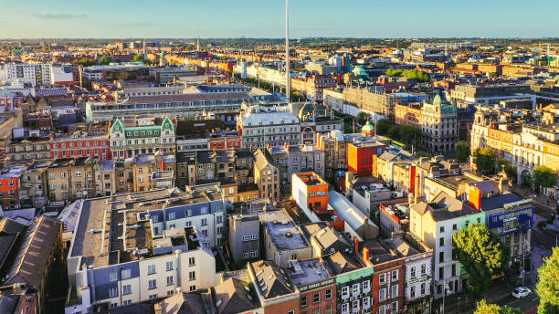 Dublin City aerial view with Liffey river and O'Connell bridge during sunset Dublin aerial view with Liffey river and O'Connell bridge during sunset dublin republic of ireland stock pictures, royalty-free photos & images