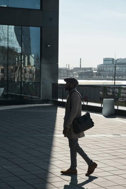 istock Man walking on the street 1319921631