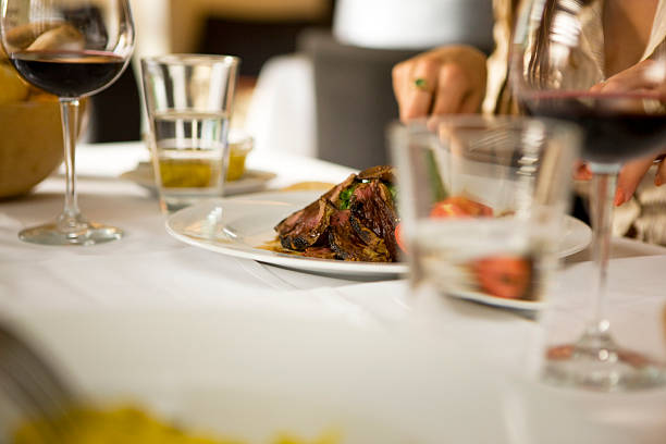 Woman eating carpaccio, selective focus, canon 1Ds mark III