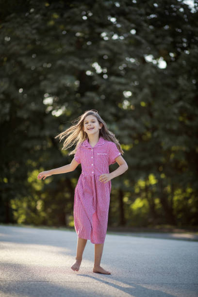 istock Little happy girl spending time in nature. 1319923400