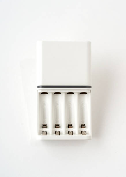 istock Dry cell battery charger isolated on white background. 1319924651