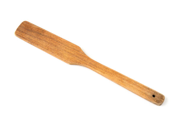 istock Wood spatula isolated on white background. 1319924813
