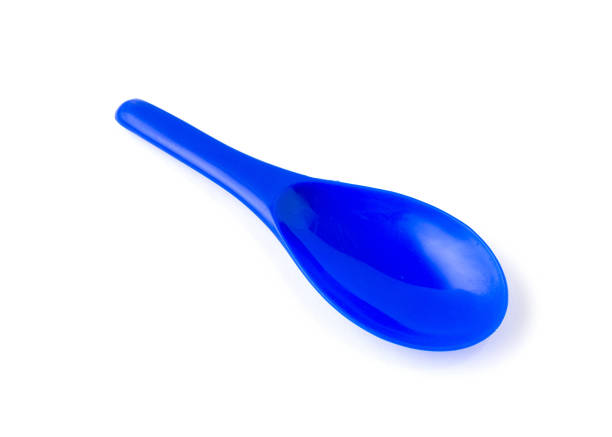 istock Blue color of plastic spatula isolated on white background. 1319924860