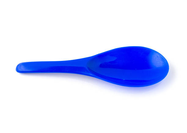 istock Blue color of plastic spatula isolated on white background. 1319924900