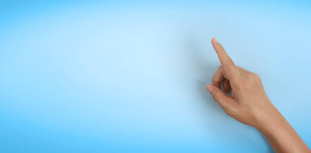 istock Pointing at something closeup of hand 1319927644