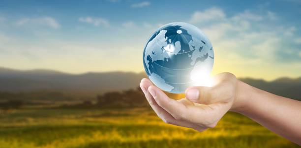 istock Globe in hand, Earth energy saving concept, image furnished by NASA 1319927771