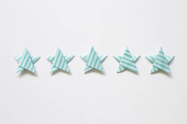 istock Green stripe pattern five stars quality rating on white background. top view 1319928335