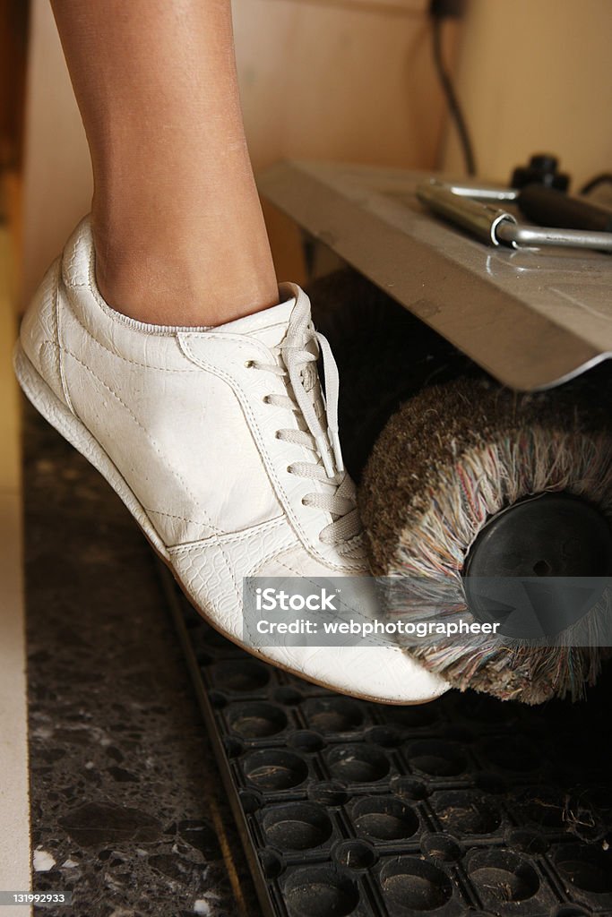 Cleaning sport shoes Cleaning sport shoes, selective focus, canon 1Ds mark III Machinery Stock Photo