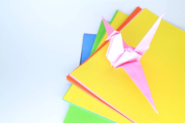 istock Crane on origami in the light 1319929488